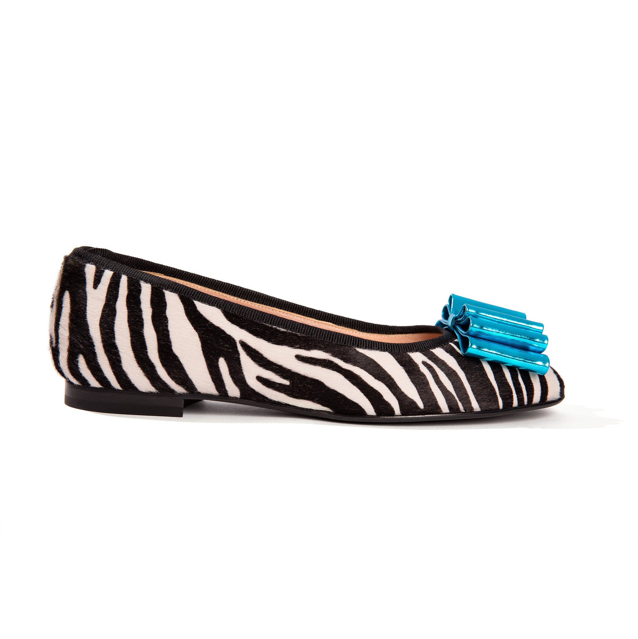 Faux zebra ballet flats with turquoise bow